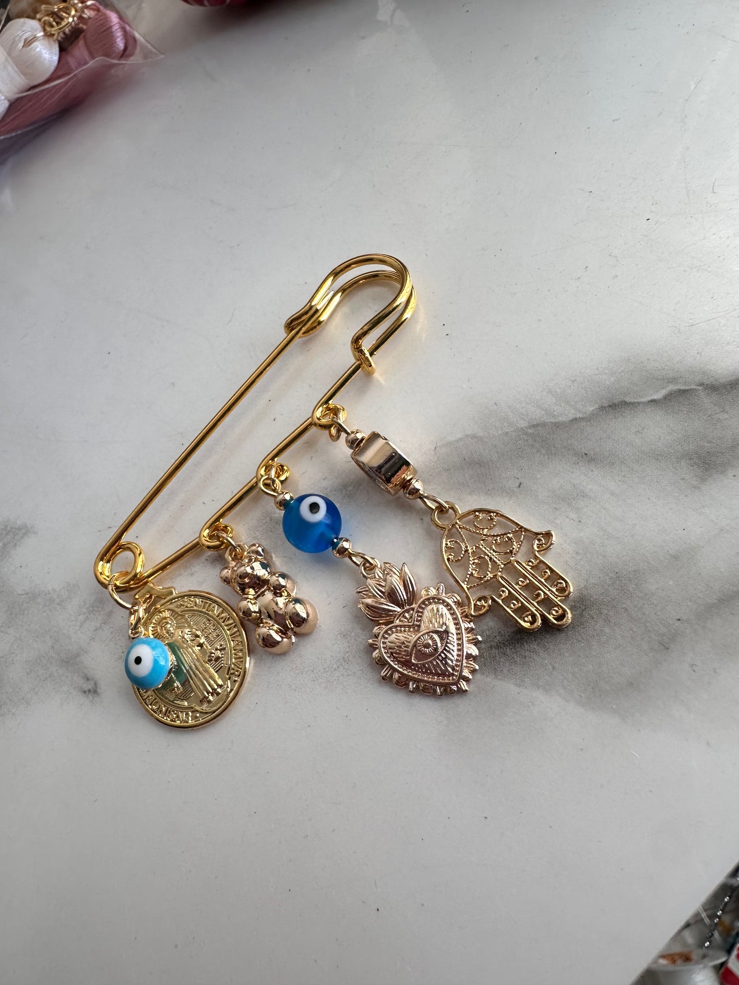Broche de protección
